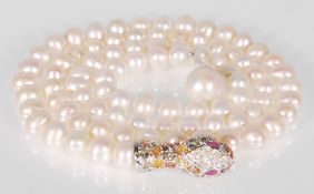 A ladies necklace formed from a row of cultured pe