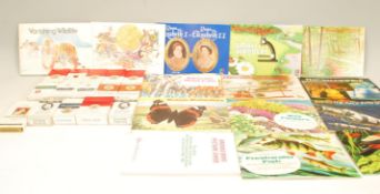 A collection of vintage 20th Century cigarette and