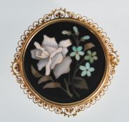 A 20th Century Pietra Dura brooch of round form de