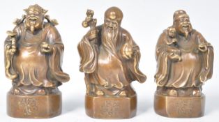 THREE 20TH CENTURY REPUBLIC PERIOD SMILING BRONZE