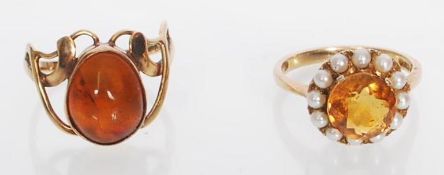 Two 9ct gold ladies dress rings to include one set