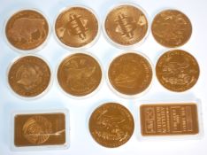 A mixed group of mostly gold plated coins to include 2x 2013 copper Bitcoin coins, commemorative