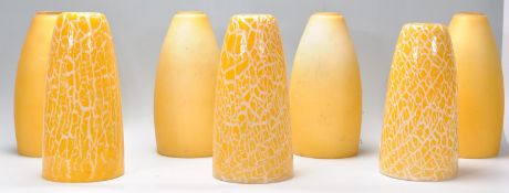 A collection of colourful 20th century glass lamp / light shades. To include Italian style studio