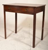 A 19th Century Georgian mahogany writing table / side table being raised on squared legs with two