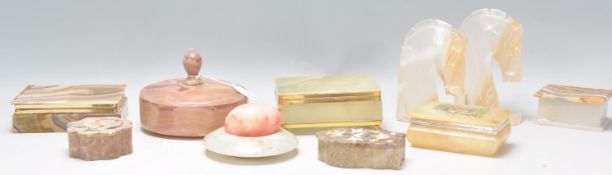 A mixed group of vintage 20th Century marble and onyx wares to include an onyx trinket box raised on