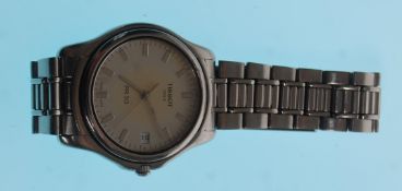 A ladies Tissot PR 50 wrist watch having a white face with baton numeral markers set within a