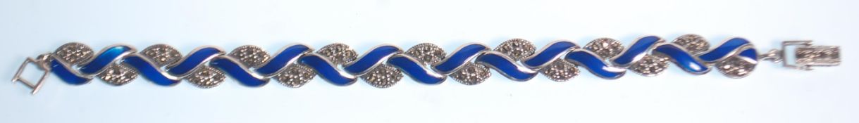 A stamped 925 silver bracelet of plaited design set with marcasites and alternate blue enamelled