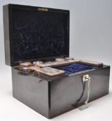 A 19th century Coromandel ladies travelling workbox - jewellery box. Of square form with button