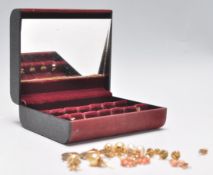 A collection of 9ct gold and yellow metal earrings. To include coral set, seed pearl, opal settings,