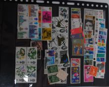 A collection of stamps to include Victorian and 19th century along with part sheets, postcards