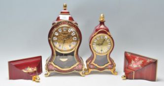 A pair of 20th Century antique style mantel clocks to include one marked Elux and the other Du