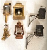 A collection of old vintage 19th and 20th century lamps to include brass cased with WR monogram,