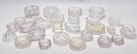 A collection of cut glass table salts / salt cellars dating from the 19th Century. The table salts