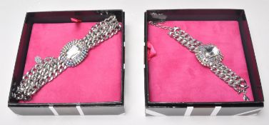 Butler & Wilson - A good white metal dual link chain necklace having a central crystal pendant