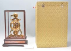 Shandong Compas Clocks & Watches Co - A stunning contemporary glass cased, 24k gold coated 8 Day