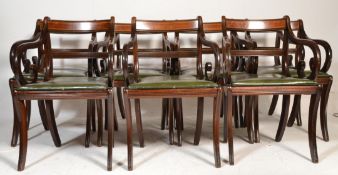 A set of 11 mahogany and leather carver armchairs.