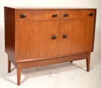 A vintage retro mid 20th Century teak wood sideboard credenza raised on angular tapering supports