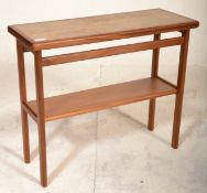 A retro mid 20th Century teak framed occasional side table having a tile top with second tier below.