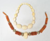 A 19th Century heavy bone bead necklace having seventeen graduating beads. Together with a stained