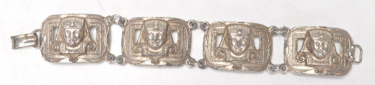 An early 20th Century Art Deco Egyptian revival silver white metal bracelet having pharaohs head