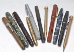 A good collection of various vintage 20th Century fountain pens / ballpoint and propelling pens /