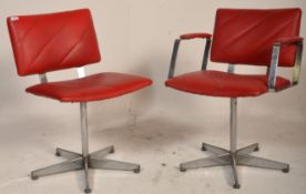 A set of 2 retro mid century chrome and red faux leather upholstered swivel chairs. To include