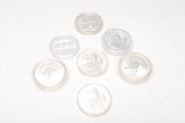 A mixed group of seven 999 fine silver coins to include two 1998 Australian One Dollar coins, two