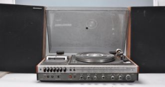 A retro 20th Century National Panasonic music center / stereogram model SG-1070L. Teak cased with