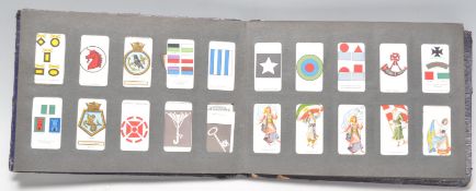 An album of vintage cigarette cards to include some close to full sets; Player's Army Corps &