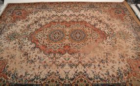 A large early 20th century Persian / Islamic rug with beige ground having central medallion design ,