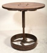 A good 20th century upcycled Industrial cafe table. Raised on Industrial trolley - tram wheel base