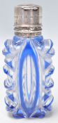 A lovely 19th Century Victorian blue tinted thick cut glass scent bottle having a silver hinged