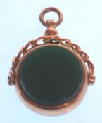 A Victorian 9ct / 375 Chester hall marked swivel fob with bloodstone agate. Chester hallmarked for