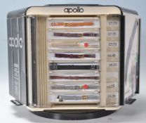 A vintage 20th Century Apollo watch strap shop advertising display stand having a black panels