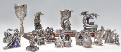 A selection of Myth and Magic figurines / ornaments, most depicting dragons, some set with cut