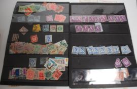 A collection of stamps to include uk and commonwealth , 19th and 20th century along with postcards