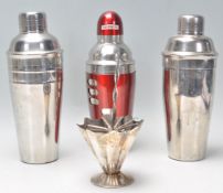 An early 20th Century Art Deco silver plate cocktail stick holder in the form of an umbrella.