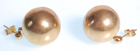 A pair of retro mid century 9ct gold ladies drop earrings of ball / sphere form set to posts and