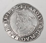 A Charles I (1625-1649) Silver Shilling having Ermine mint mark, the reverse with shield qtr and