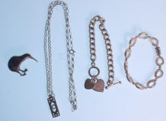 A collection of ladies silver jewellery to include a spacer bracelet with oval links set with