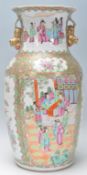 A 19th Century Chinese Cantonese famille rose vase with handpainted scenes of people, birds and