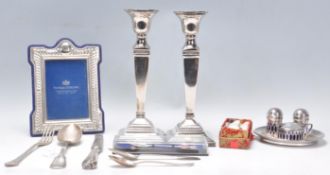 A mixed group of silver and silverplate wares dating from the early 20th Century to include a