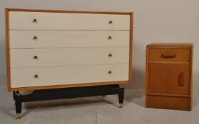 E. Gomme- G Plan- Brandon Range- A retro 20th Century light oak chest of drawers raised on