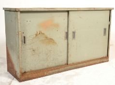A good retro mid 20th Century Industrial metal cupboard / cabinet raised on a metal plint base
