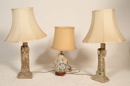 A pair of faux carved stone religious large table