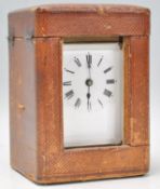 A late 19th Century French brass cased carriage clock having a white face with Roman numeral chapter