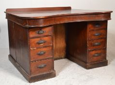 A Victorian 19th century large mahogany serpentine