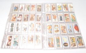 A collection of cigarette cards to include five full sets; Wills Lucky Charms, Household Hints,