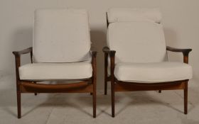 A stunning pair of retro vintage 20th Century Danish  teak wood low easy lounge chair / armchairs in