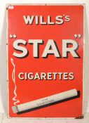 A superb vintage 20th Century Wills's Star Cigarettes enamel advertising sign having red ground with